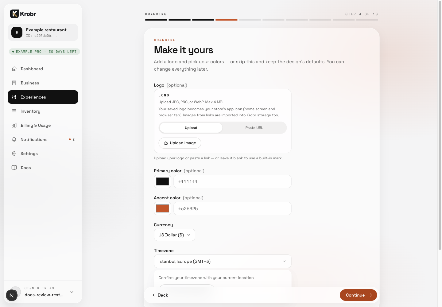 Confirm Currency and Timezone, then review optional branding before continuing.